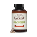 Bottle of Rootology – Breathe Free capsules for nasal, sinus, and eye health with natural ingredients shown.