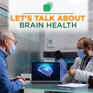 Brain Health Consultation: Doctor and elderly patient discussing brain health with a brain image on a laptop screen